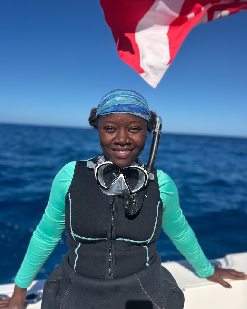 Kandize’s journey spans lionfish research, community interviews, and coral spawning—proving that conservation is both science and story.